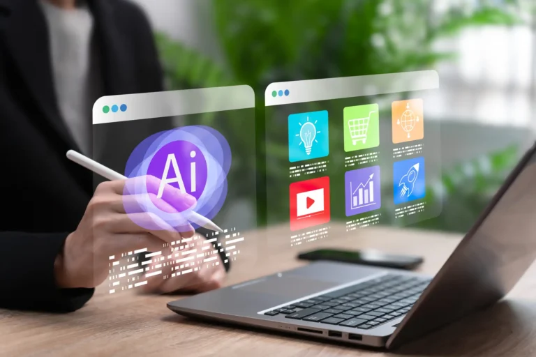 A person with a white stylus gestures toward a laptop computer with floating graphs, charts, and icons representing digital innovation and artificial intelligence.